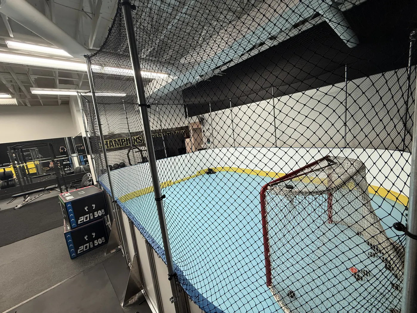 The synthetic ice rink alongside the training floor